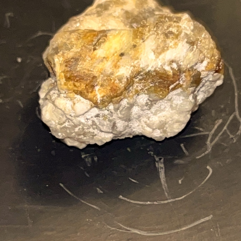 Raw gold in quartz crystal